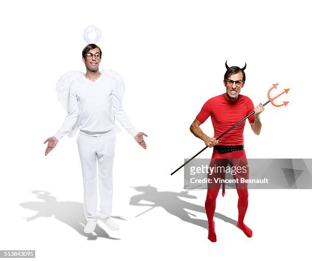 angel and devil side by side - devil stock pictures, royalty-free photos & images