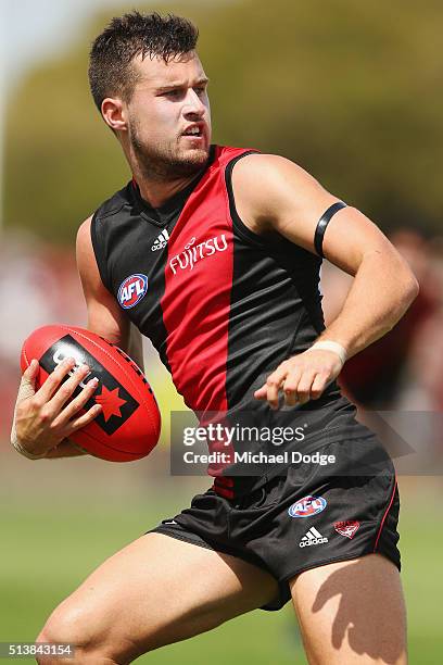 Jackson Merrett of the Bombers looks upfield during the 2016 AFL NAB Challenge match between the Essendon Bombers and the Geelong Cats at Deakin...