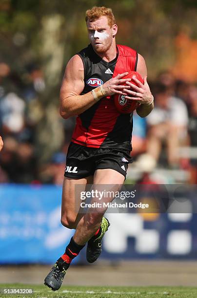 Adam Cooney of the Bombers marks the ball during the 2016 AFL NAB Challenge match between the Essendon Bombers and the Geelong Cats at Deakin...