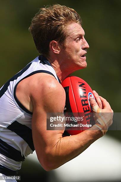 Josh Caddy of the Cats marks the ball during the 2016 AFL NAB Challenge match between the Essendon Bombers and the Geelong Cats at Deakin Resserve on...