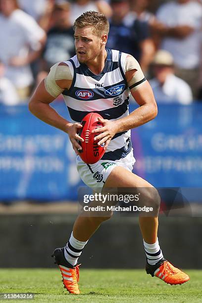 Tom Ruggles of the Cats looks upfield during the 2016 AFL NAB Challenge match between the Essendon Bombers and the Geelong Cats at Deakin Resserve on...