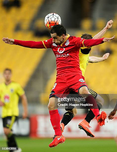 Sergio Cirio of Adelaide United and Michael McGlinchey of the Phoenix compete for a header during the round 22 A-League match between the Wellington...