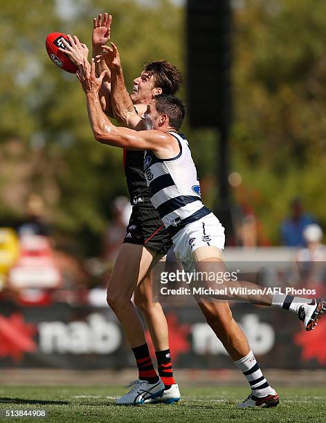 Harry Taylor of the Cats and Sam Grimley of the Bombers in action during the 2016 NAB Challenge match between the Essendon Bombers and the Geelong...