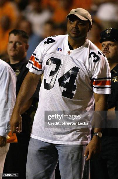Charles Barkley, an Auburn alumni, watches the Auburn Tigers play the Tennessee Volunteers on the sidelines at Neyland Stadium on October 2, 2004 in...