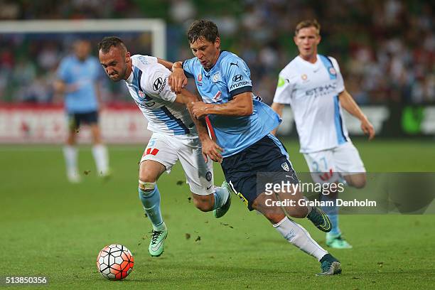Filip Holosko of Sydney FC and Ivan Franjic of Melbourne City contest the ball during the round 22 A-League match between Melbourne City FC and...