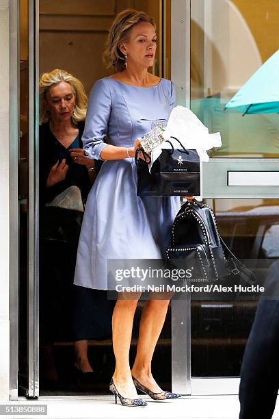 Elizabeth Murdoch leaves her father Rupert Murdoch's home on the way to his wedding to Jerry Hall on March 5, 2016 in London, England.