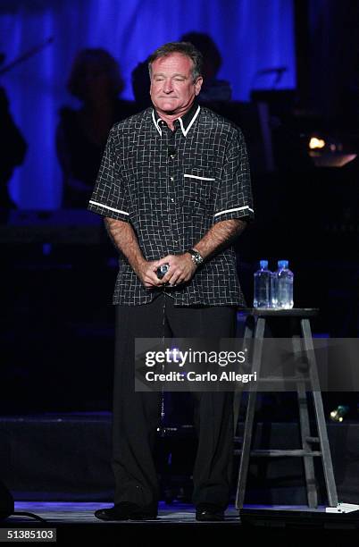 Actor Robin Williams performs on stage during the Andre Agassi Charitable Foundations 9th Annual "Grand Slam for Children" concert benefit at the MGM...