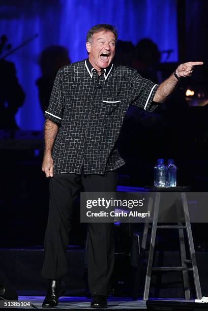 Actor Robin Williams performs on stage during the Andre Agassi Charitable Foundations 9th Annual "Grand Slam for Children" concert benefit at the MGM...