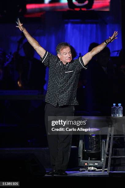 Actor Robin Williams performs on stage during the Andre Agassi Charitable Foundations 9th Annual "Grand Slam for Children" concert benefit at the MGM...