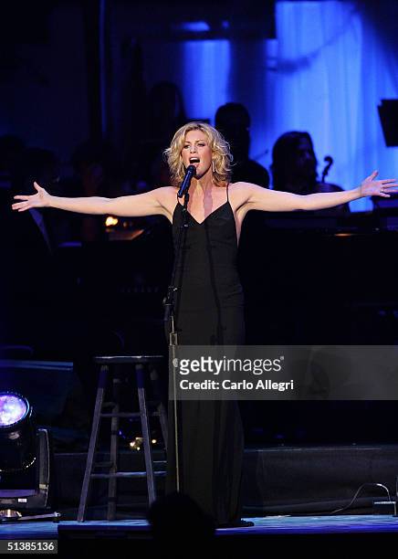 Singer Faith Hill performs on stage during the Andre Agassi Charitable Foundations 9th Annual "Grand Slam for Children" concert benefit at the MGM...