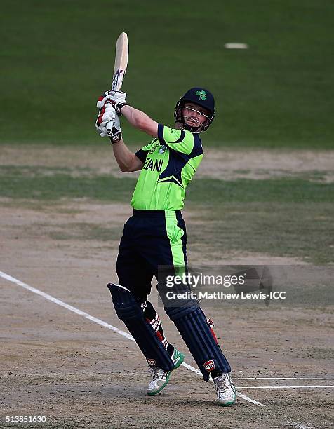 William Porterfield, Captain of Ireland hits the ball towards the boundary during the ICC Twenty20 World Cup warm-up match between Ireland and...