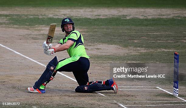 Gary Wilson of Ireland hits the ball towards the boundary during the ICC Twenty20 World Cup warm-up match between Ireland and Zimbabwe at the HPCA...