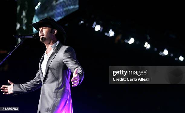 Singer Tim McGraw performs on stage during the Andre Agassi Charitable Foundations 9th Annual "Grand Slam for Children" concert benefit at the MGM...