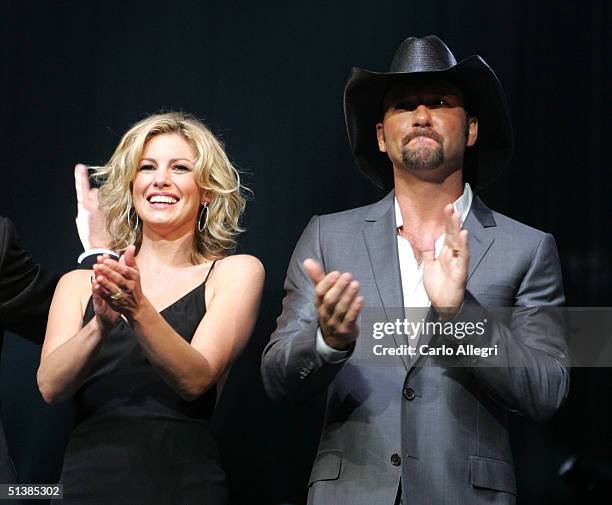 Singer Faith Hill and Tim McGraw performs on stage during the Andre Agassi Charitable Foundations 9th Annual "Grand Slam for Children" concert...