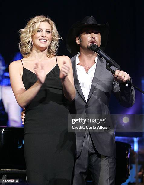 Singers Faith Hill and Tim McGraw performs on stage during the Andre Agassi Charitable Foundations 9th Annual "Grand Slam for Children" concert...