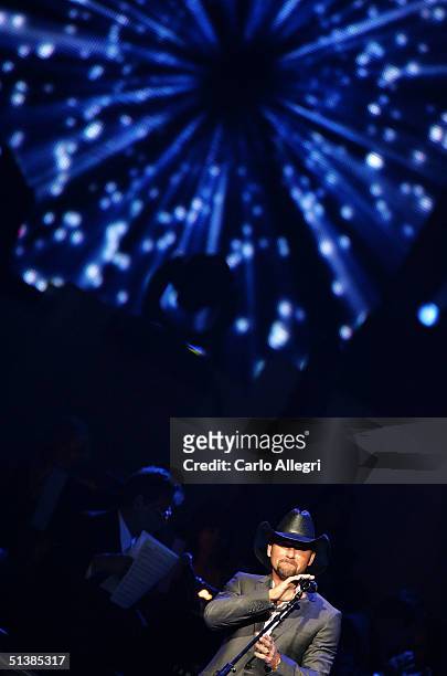 Singer Tim McGraw performs on stage during the Andre Agassi Charitable Foundations 9th Annual "Grand Slam for Children" concert benefit at the MGM...