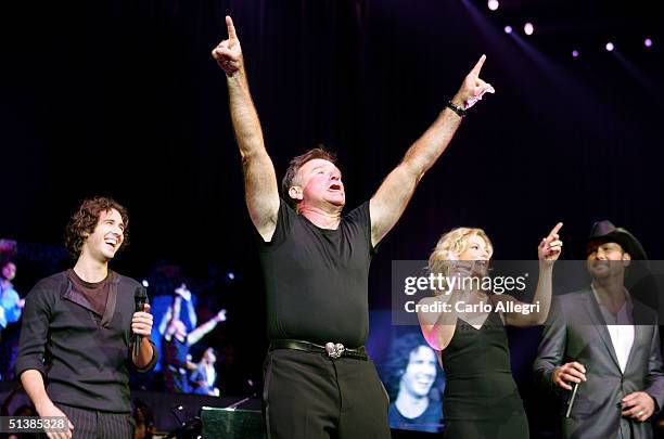 Musician Josh Groban, actor Robin Williams, singer Faith Hill and singer Tim McGraw perform on stage during the Andre Agassi Charitable Foundations...