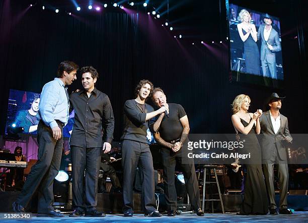 Actor Ray Romano, musicians William Joseph, Josh Groban, actor Robin Williams, singer Faith Hill and singer Tim McGraw perform on stage during the...