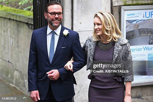 James Murdoch and his wife Kathryn Hufschmid arrive at St Bride's church on Fleet Street in central London on March 5 to attend a ceremony of...