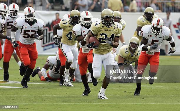 Chris Woods of the Georgia Tech Yellow Jackets runs against the Miami Hurricanes on October 2, 2004 at Grant Field in Atlanta, Georgia.