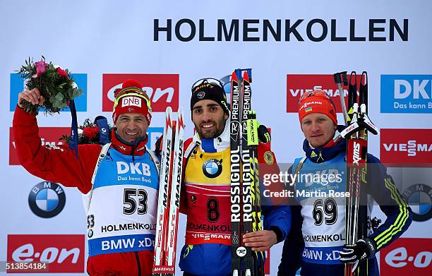 Ole Einar Bjoerndalen of Norway, Martin Fourcade of France and Sergey Semenov of Ukraine celebrate after the men's 10km sprint during day three of...