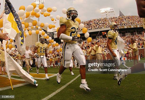 Dawan Landry of the Georgia Tech Yellow Jackets enters the field to play against the Miami Hurricanes on October 2, 2004 at Grant Field in Atlanta,...