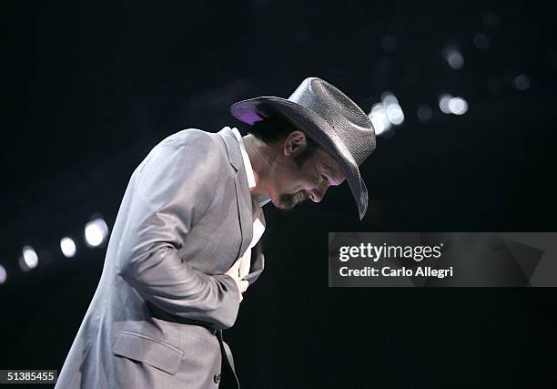 Singer Tim McGraw performs on stage during the Andre Agassi Charitable Foundations 9th Annual "Grand Slam for Children" concert benefit at the MGM...