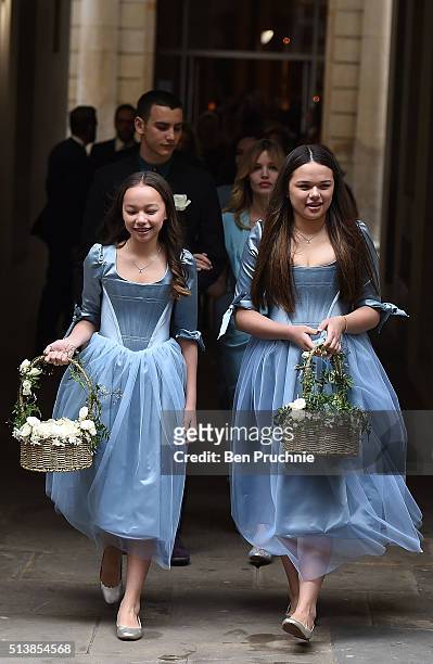 Chloe and Grace Helen Murdoch leave after the wedding of Jerry Hall to Rupert Murdoch at St Brides Church, Fleet Street, on March 5, 2016 in London,...