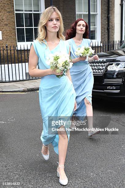 Georgia May Jagger and Elizabeth Jagger arrive at Spencer House for the Wedding Reception on March 5, 2016 in London, England.