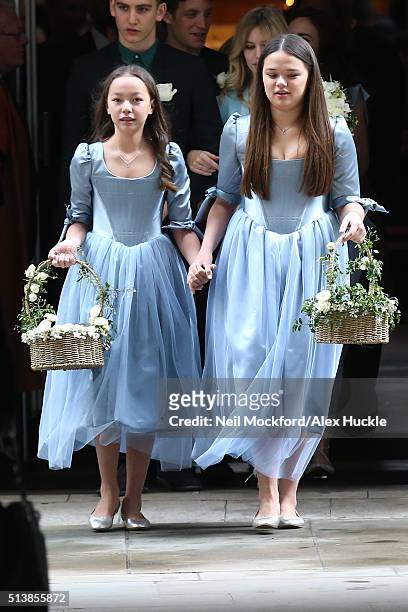 Chloe and Grace Helen Murdoch leave St Brides Church after the wedding of Jerry Hall and Rupert Murdoch on March 5, 2016 in London, England.