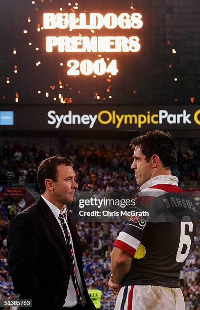 Roosters coach Ricky Stuart and retiring Roosters captain Brad Fittler stand dejected after being defeated by the Bulldogs during the NRL Grand Final...