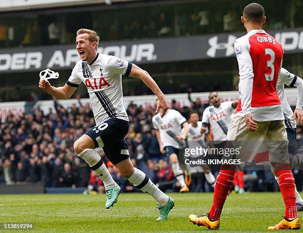 Tottenham Hotspur's English striker Harry Kane celebrates after scoring their second goal during the English Premier League football match between...