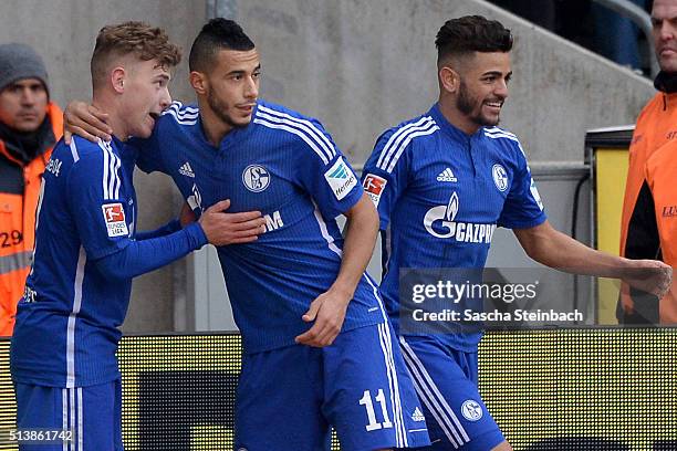 Max Meyer of Koeln celebrates with team mates after scoring his team's second goal during the Bundesliga match between 1. FC Koeln and FC Schalke 04...