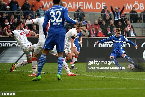 Max Meyer of Schalke scores his team's second goal during the Bundesliga match between 1. FC Koeln and FC Schalke 04 at RheinEnergieStadion on March...