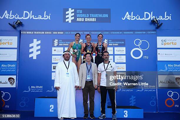 Ashley Gentle of Australia , Jodie Stimpson of Great and Helen Jenkins of Great Britain pose with General Abdel Malik Jani, Member of the Technical...