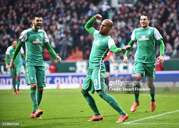 Theo Selassie of Bremen celebrates scoring the third goal during the Bundesliga match between Werder Bremen and Hannover 96 at Weserstadion on March...