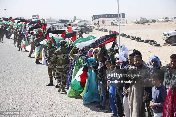 Algerians welcome United Nations Secretary Genral Ban Ki-moon before his arrival at the Sahrawi refugee camp near the Tindouf town of Algeria on...