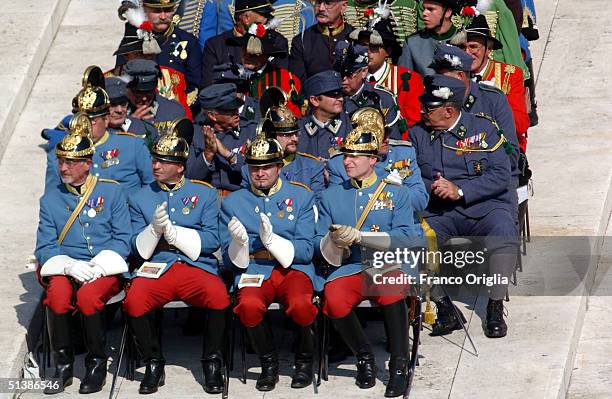 Austrian soldiers dressed in historic period uniforms attend a beatification ceremony in St. Peter's Square October 3 , 2004 in Vatican City. Pope...