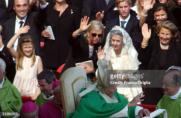Archduke Lorenz of Austria, Princess Astrid of Belgium, and queen Fabiola of Belgium greet Pope John Paul II at the end of a beatification ceremony...