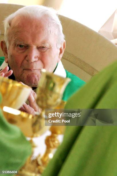 Pope John Paul II attends a beatification ceremony held in St. Peter's Square October 3 , 2004 in Vatican City. Pope John Paul II named five...