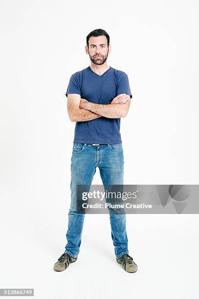 portrait of man - blue pants stock-fotos und bilder
