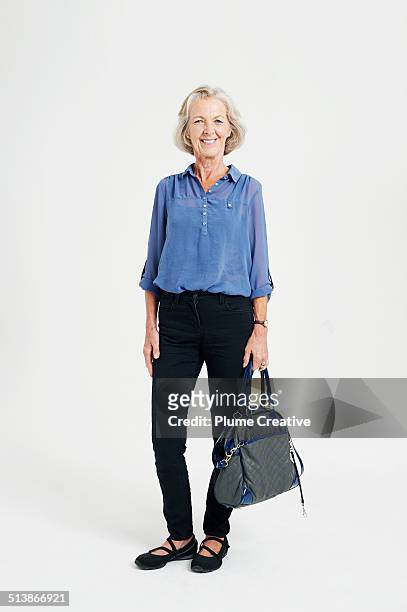 portrait of woman - blue purse stock pictures, royalty-free photos & images
