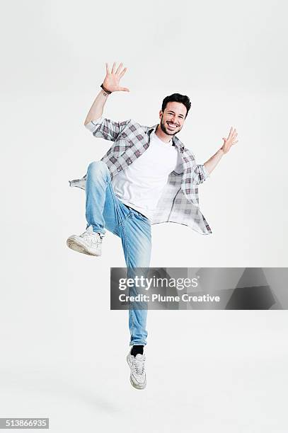 portrait of man - man jumping stock pictures, royalty-free photos & images