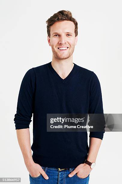 portrait of man - hände in den taschen stock-fotos und bilder