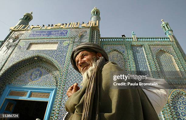 An Afghan man visits the Blue Mosque as election officials prepare for the presidential elections October 3, 2004 in Mazar I Sharif, Afghanistan. On...
