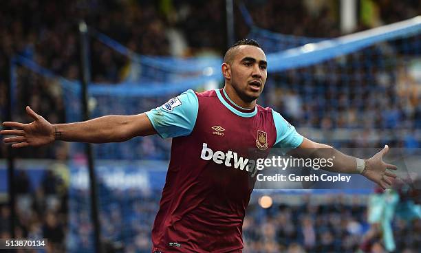 Dimitri Payet of West Ham United celebrates scoring his team's third goal during the Barclays Premier League match between Everton and West Ham...