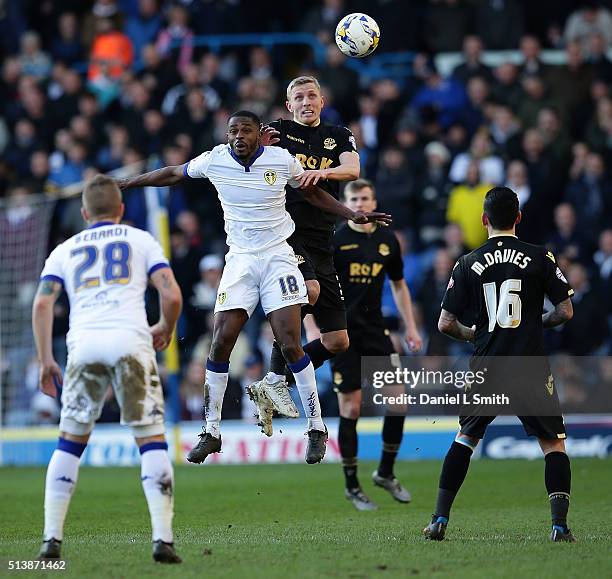 Mustapha Carayol of Leeds United FC and Dean Moxey of Bolton Wanderers FC comepte for the ball during the Sky Bet Championship League match between...