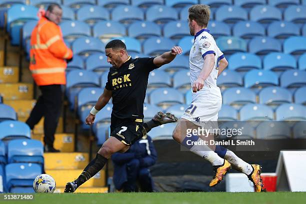 Charlie Taylor of Leeds United FC under presser from Liam Feeney of Bolton Wanderers FC during the Sky Bet Championship League match between Leeds...