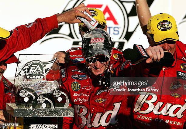 Dale Earnhardt Jr. Celebrates in victory lane after winning the NASCAR Nextel Cup EA Sports 500 on October 3, 2004 at Talladega Superspeedway in...