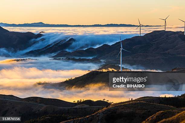 wind power in the sea of clouds,guilin,china - guilin stock pictures, royalty-free photos & images
